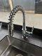 Kitchen tap with pull out and swivel spout