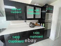 Modern luxury Black Unit & Granite white worktop kitchen. Appliances included