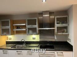 Used kitchen with island (includes granite worktops, appliances, and flooring)